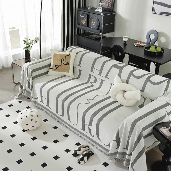 Jeté de canapé gris en polyester